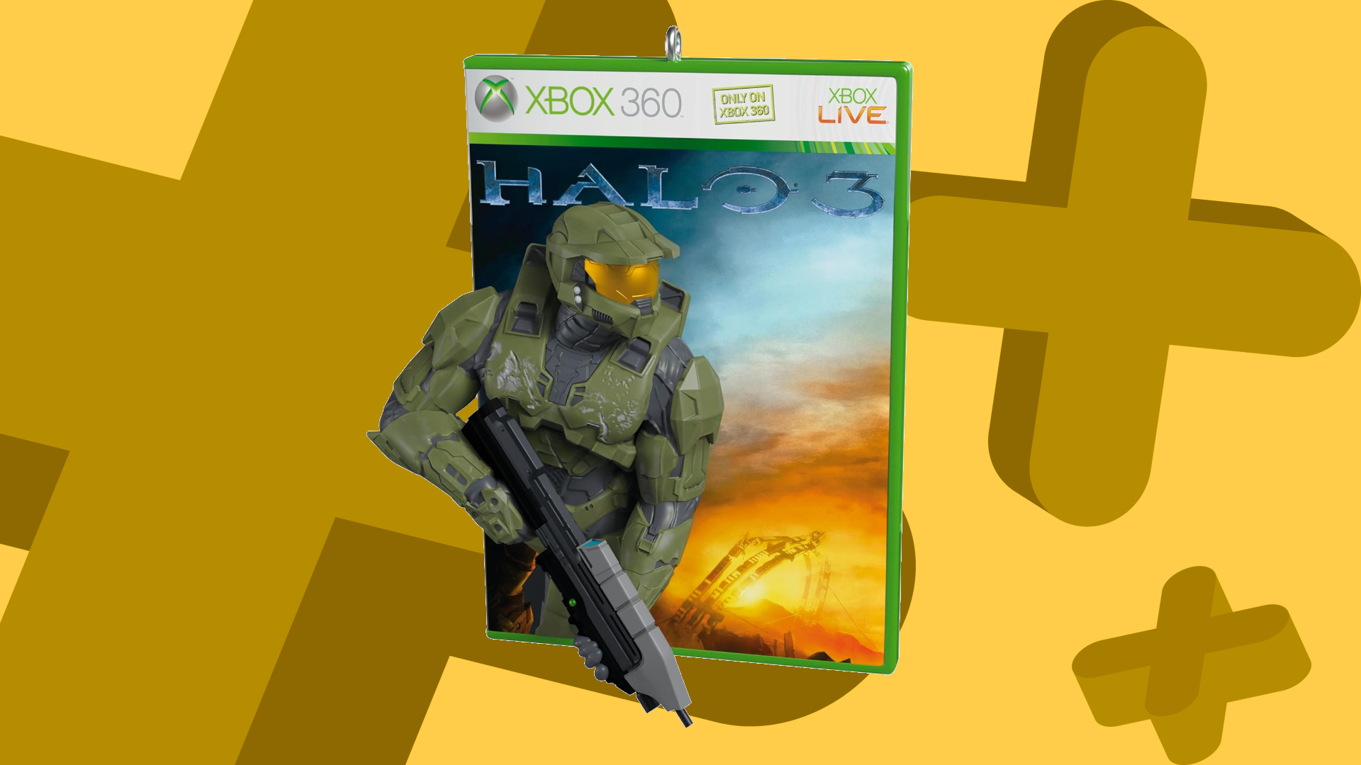 Master Chief and Halo 3 box ornament against a yellow background