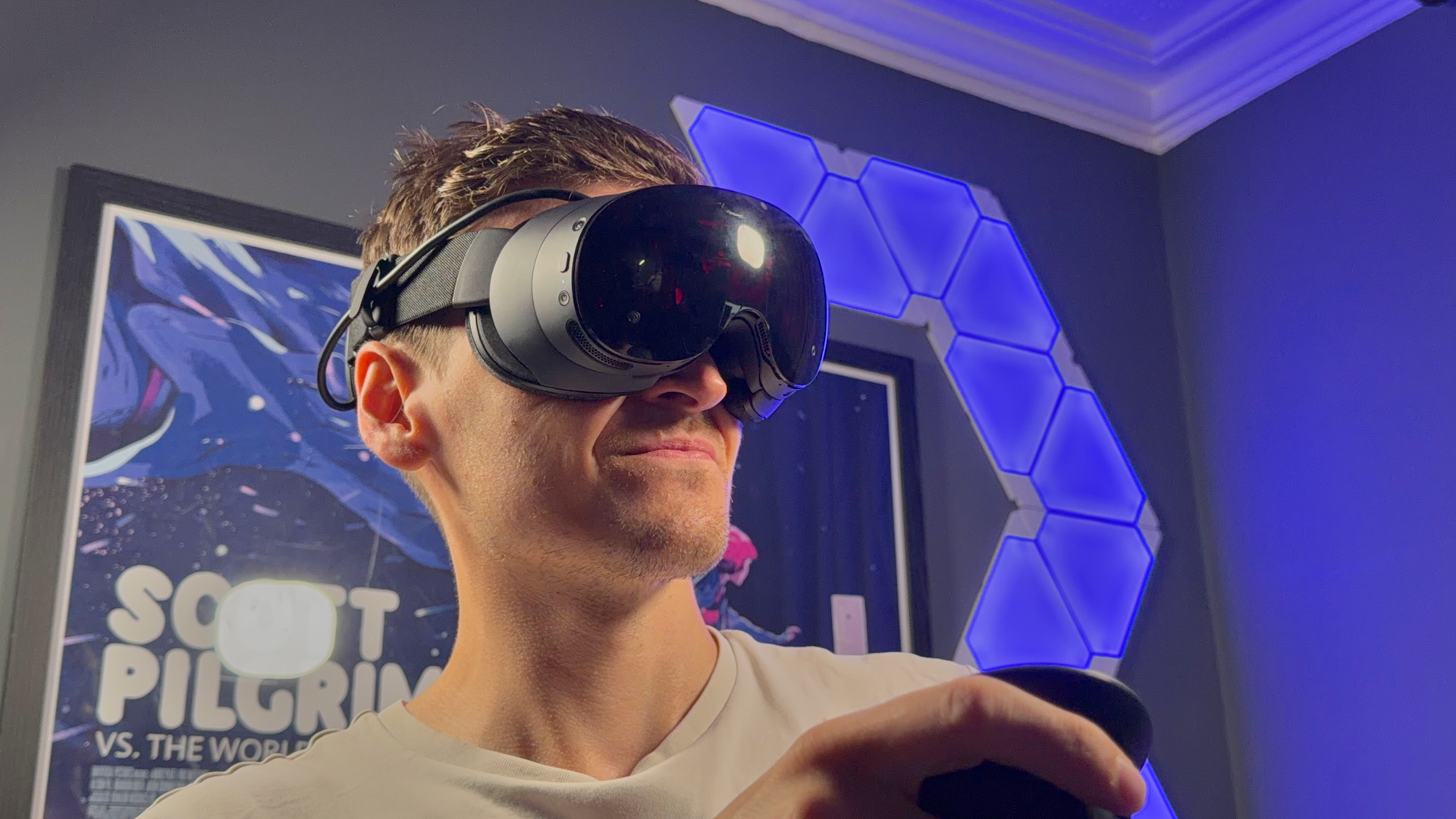 Jacob Ridley, Managing Editor for Hardware at PC Gamer, wearing the Steam Frame on his head.