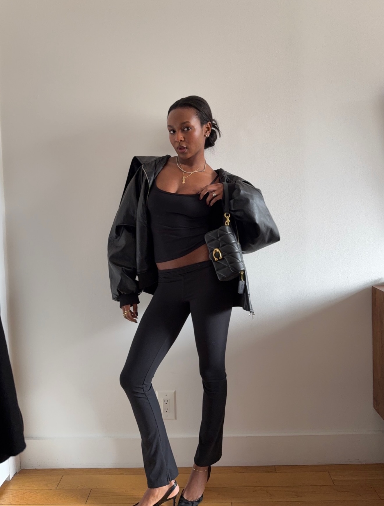 An image of a woman wearing early fall trends 2026