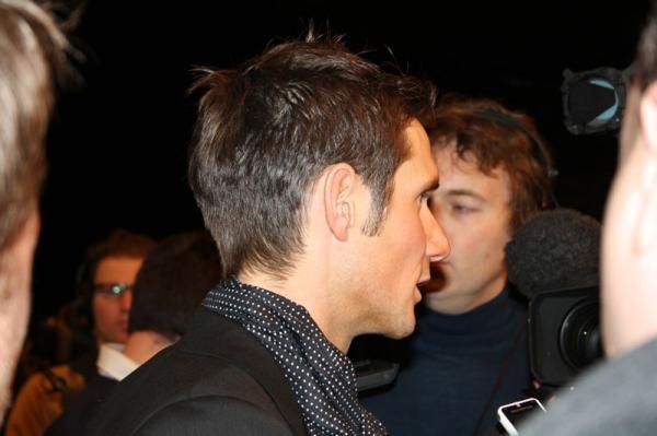 Frank Schleck greets the press after the team presentation