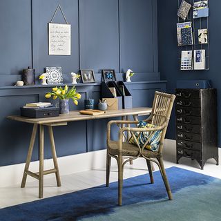 room with dark blue and wooden table