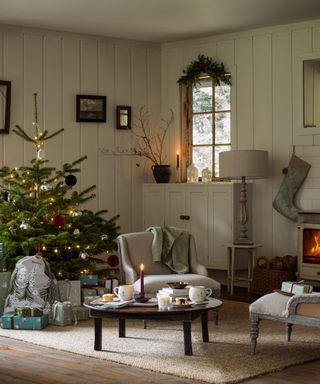 A traditional living room with Christmas tree