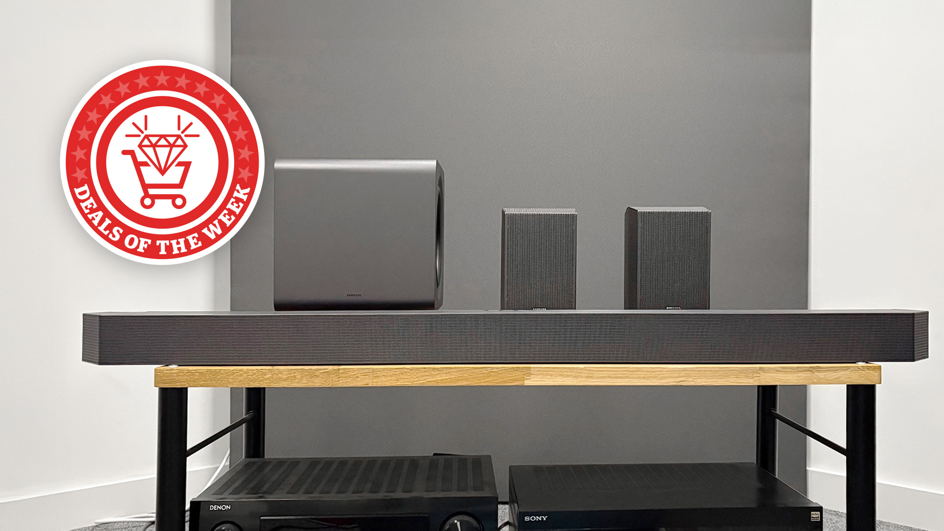 The Samsung HW-Q990F soundbar system with the Deals of the Week logo overlaid