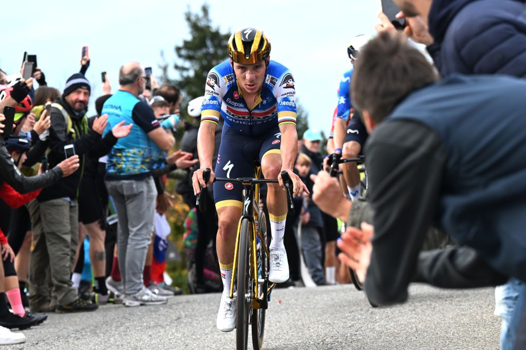 COMO ITALY OCTOBER 12 Remco Evenepoel of Belgium and Team Soudal QuickStep competes in the chase group while fans cheer during the 118th Il Lombardia 2024 a 255km one day race from Bergamo to Como UCIWT on October 12 2024 in Como Italy Photo by Tim de WaeleGetty Images