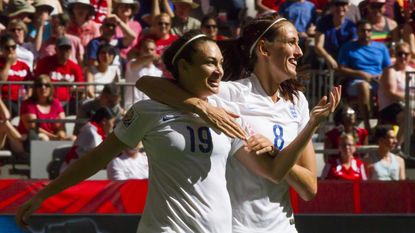VANCOUVER, BC - JUNE 27: Jodie Taylor #19 of England celebrates her goal against Canada with teammate Jill Scott #8 during the FIFA Women's World Cup Canada 2015 Quarter Final match between t
