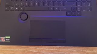 The touchpad and Asus Dial on the Asus ProArt Studiobook 16 OLED