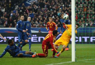 Pedro scores for Spain against France in a World Cup qualifier at the Stade de France in 2013.