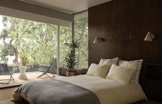 bedroom with green views at Richard Neutra's Silver Lake Tree House