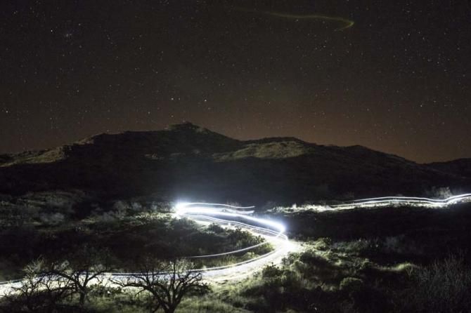 Racers at night in the 24 Hours of Old Pueblo