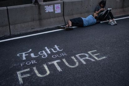 Hong Kong protesters agree to scale back demonstrations