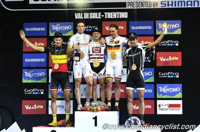 Elite men's eliminator Val di Sole World Cup podium: Fabrice Mels, Miha Halzer, Daniel Federspiel, Simon Gegenheimer, Philip Buys