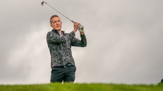 A golfer hitting an iron shot at Gleneagles