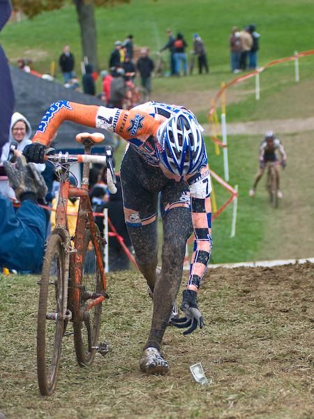 Barry Wicks (Kona) cleans up some paper that littered the course.