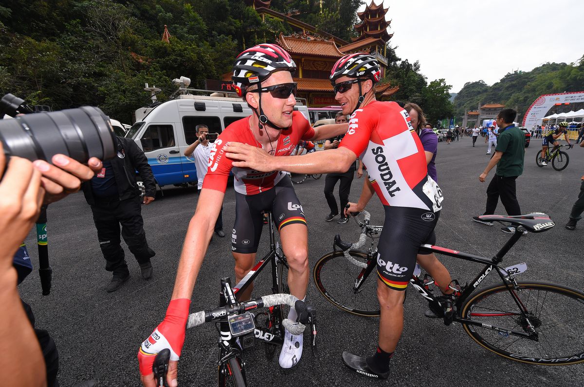 Adam Hansen congratulates Lotto Soudal teammate Tim Wellens on his stage win