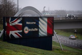 Le Shuttle Eurotunnel sign next to a road