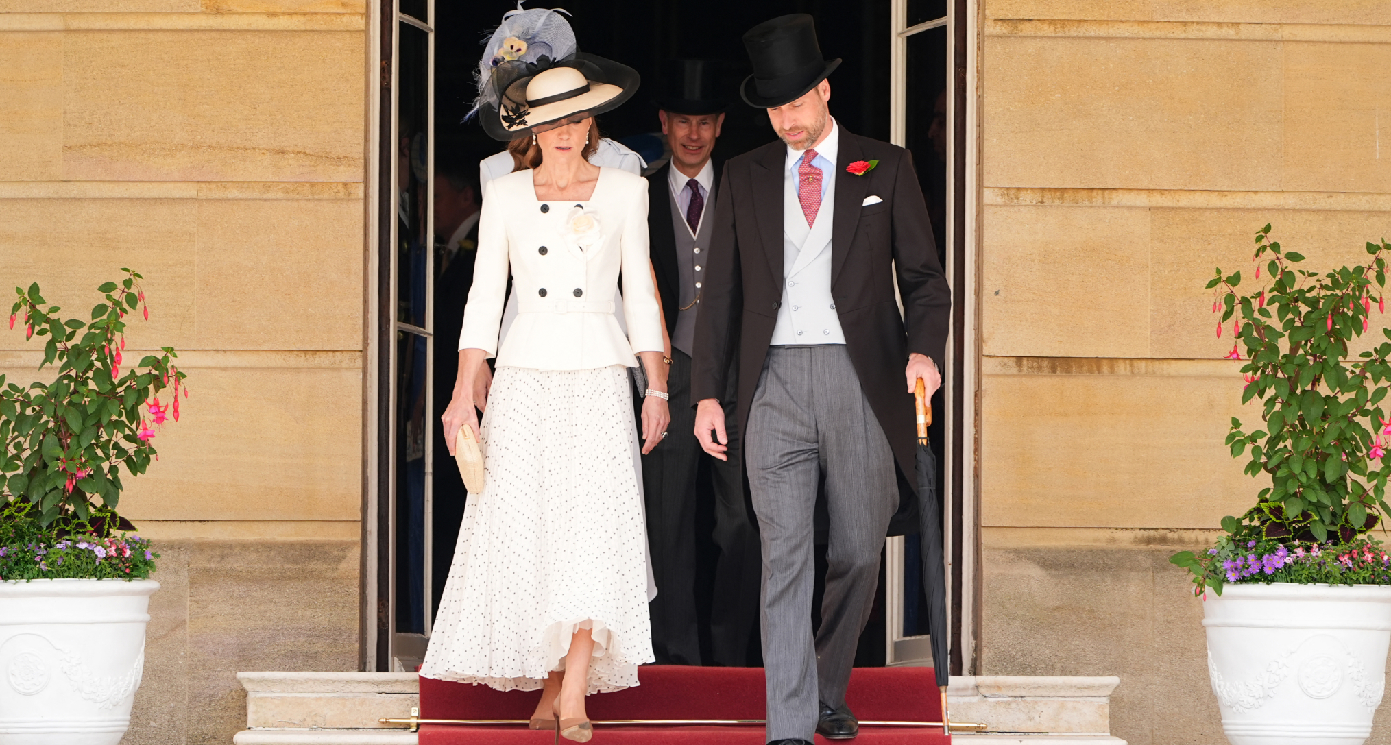 Princess Kate wearing a white blazer dress at a garden party