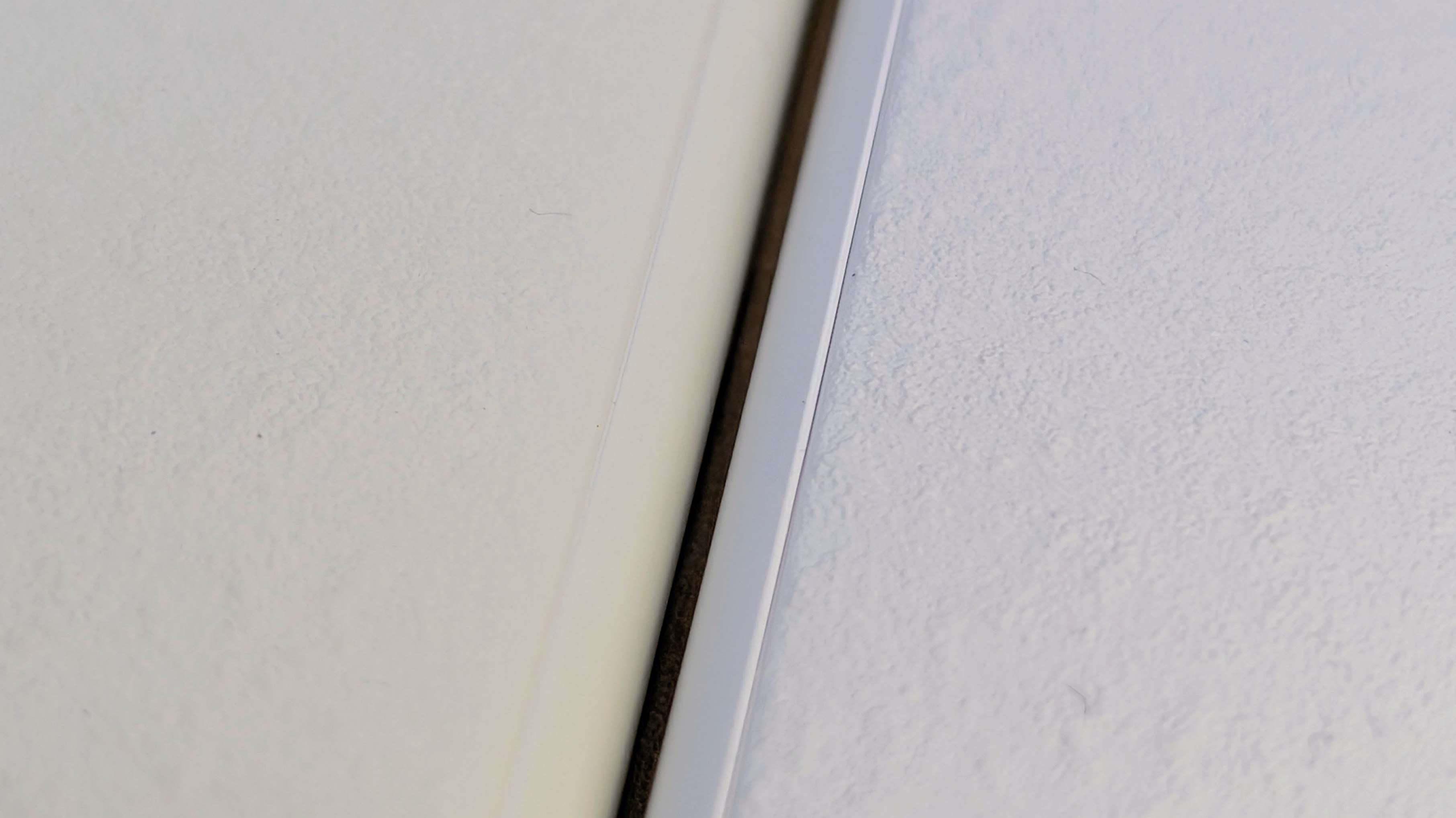 Boox Palma 2 vs Palma 2 Pro side by side close up of rear textured panel