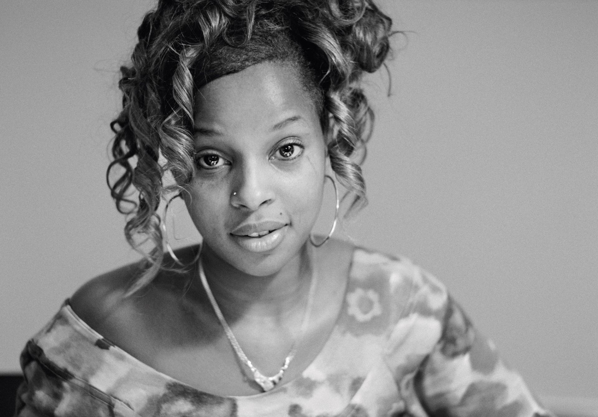 Black and white portrait of Mary J Blige, from pages of Rapper's Deluxe