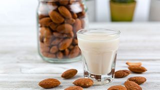 Jar of nuts and glass of milk.