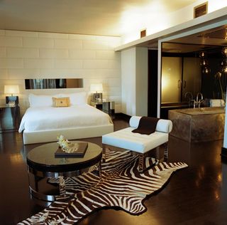 bedroom with zebra designed carpet