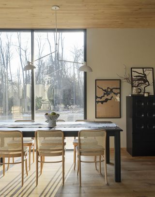dining room with two-arm pendant light