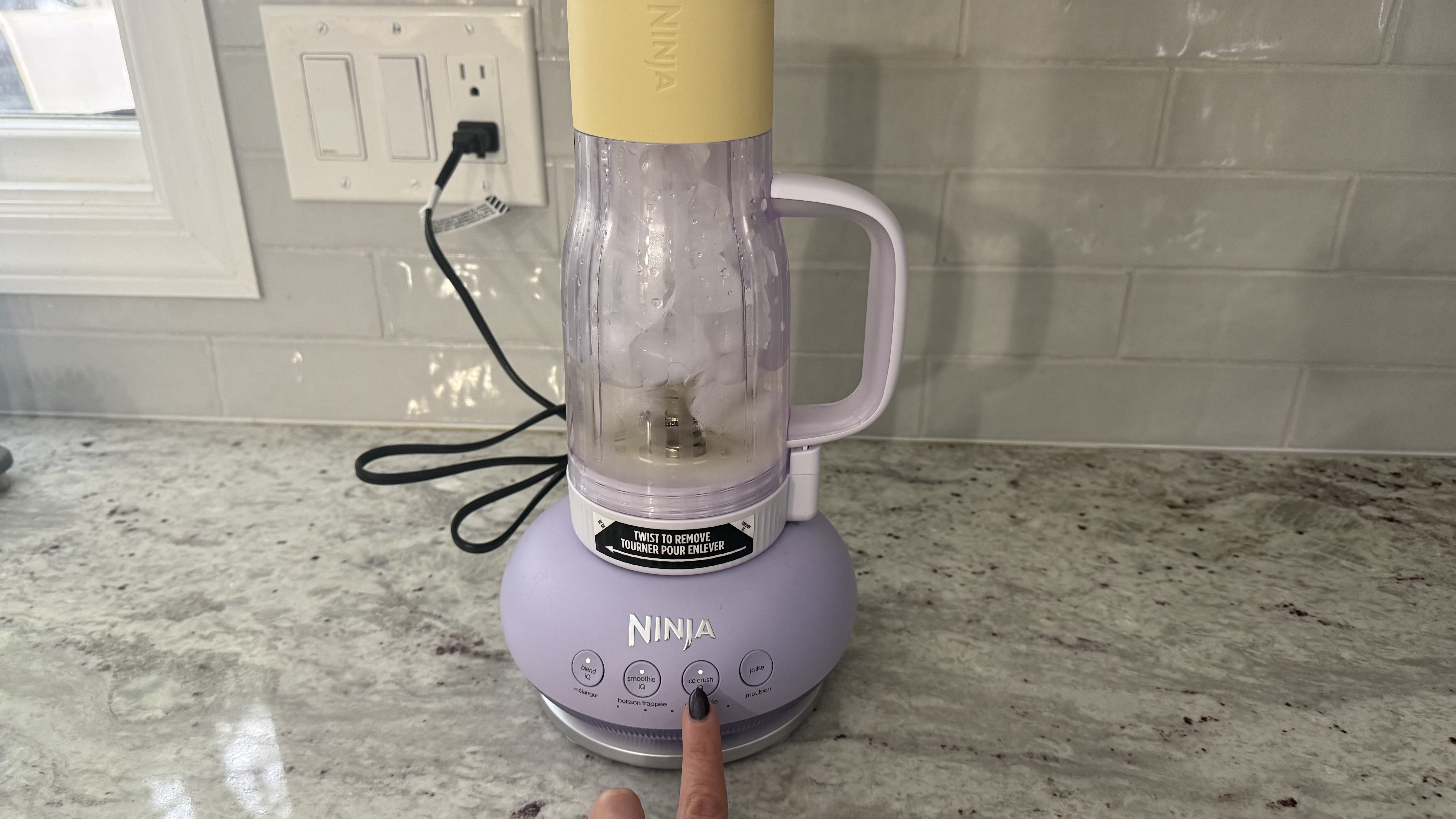 Ninja BlendBOSS&trade; Tumbler Blender with 26oz Travel Tumbler making iced lemonade