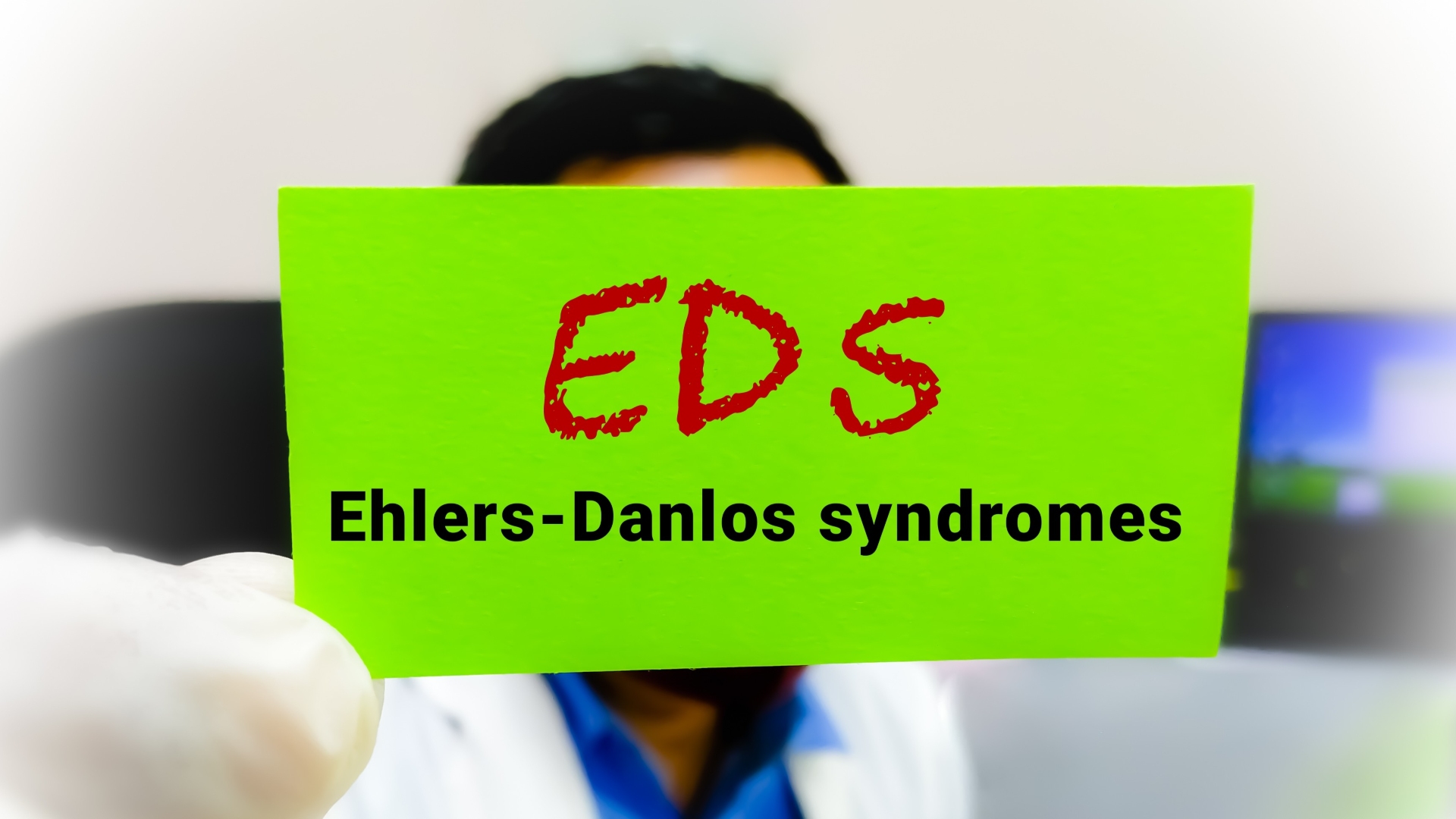 Medical conceptual image of Ehlers-Danlos syndromes term printed on green card.
