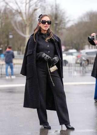 French street style - woman wearing an all-black outfit