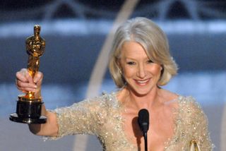 Helen Mirren accepts Best Actress in a Leading Role award for ?The Queen? at the Kodak Theatre in Los Angeles, California (Photo by Michael Caulfield/WireImage)