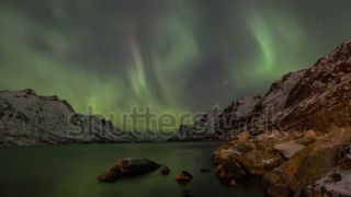 Draw attention by looping video clips like this mesmerising footage of the aurora borealis (Still from a video by Jamen Percy; click to see it on Shutterstock)