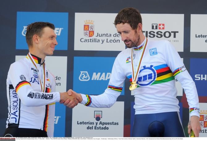 Bradley Wiggins (Great Britain) shakes Tony Martin's (Germany) hand on the podium