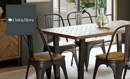 Oak dining room table and chairs in dining room