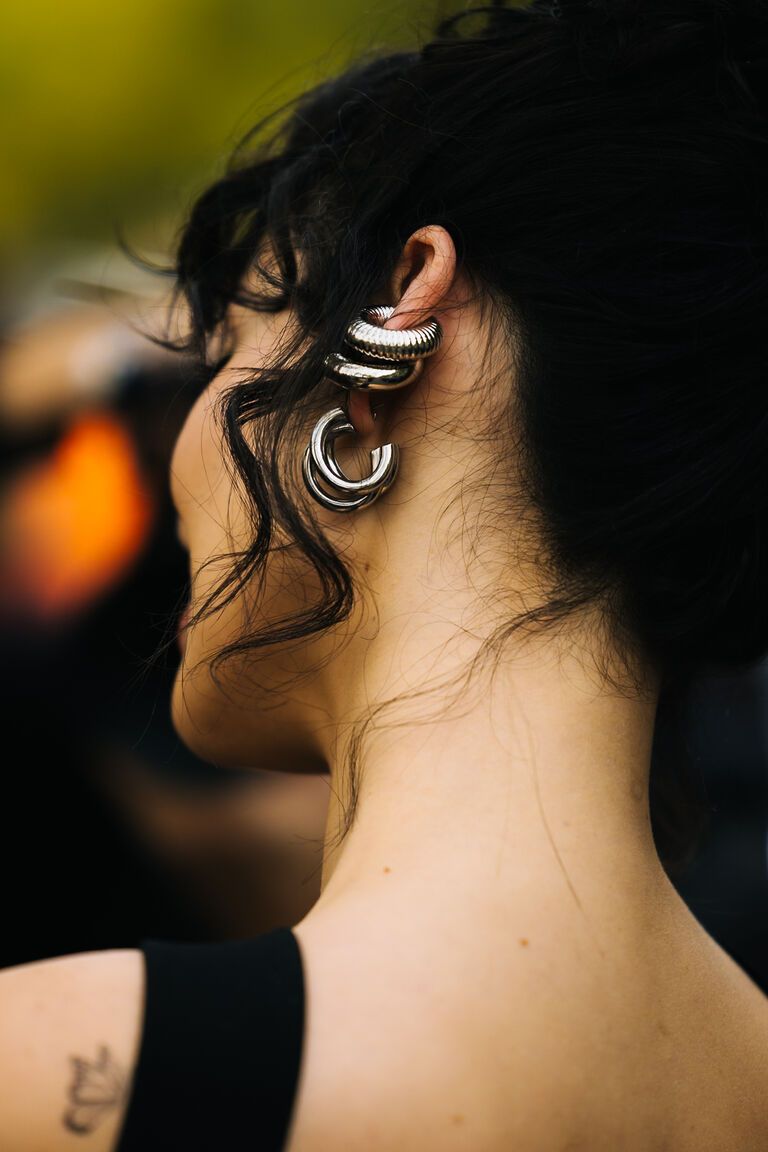 woman wearing Hoop Ear Cuff summer 2026 jewelry trend at fashion week