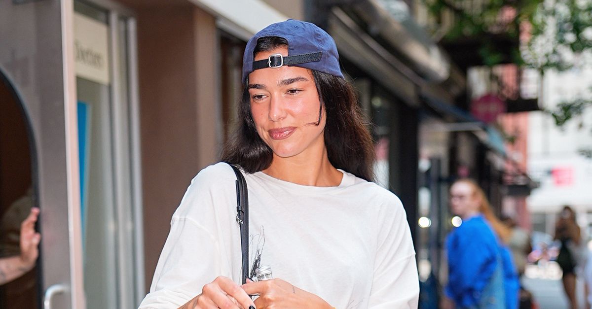 Dua Lipa Wore Jean Shorts With a Basic Trend & Chanel Flats Dua Lipa Wore Jean Shorts With a Basic Trend & Chanel Flats