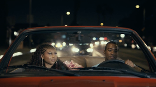 Sierra Capri and Algee Smith riding in a car in Young.Wild.Free.