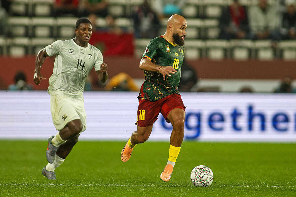 Cameroon's Bryan Mbuemo running with the ball chased by South Africa's Mbekezeli Mbokazi during the Africa Cup Of Nations Round Of 16 match between South Africa and Cameroon at Al Barid Stadium on January 4, 2026 in Rabat, Morocco.