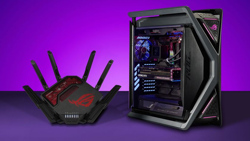 ASUS gaming router standing next to custom PC