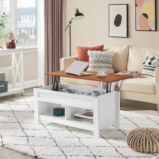 Red Barrel Studio Aspa Coffee Table in white in bright living room with laptop and coffee on table top 
