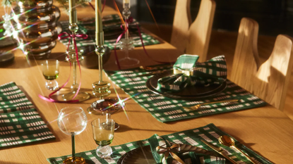 a holiday themed tablescape with crystal and glass accent details and madras plaid placemats