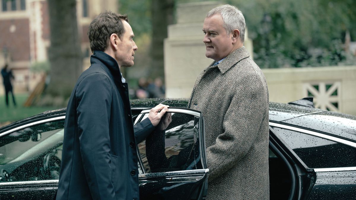 L-R: Michael Fassbender as Martian and Hugh Bonneville as Richardson in &quot;The Agency,&quot; episode 10, season 1, streaming on Paramount Plus with Showtime.