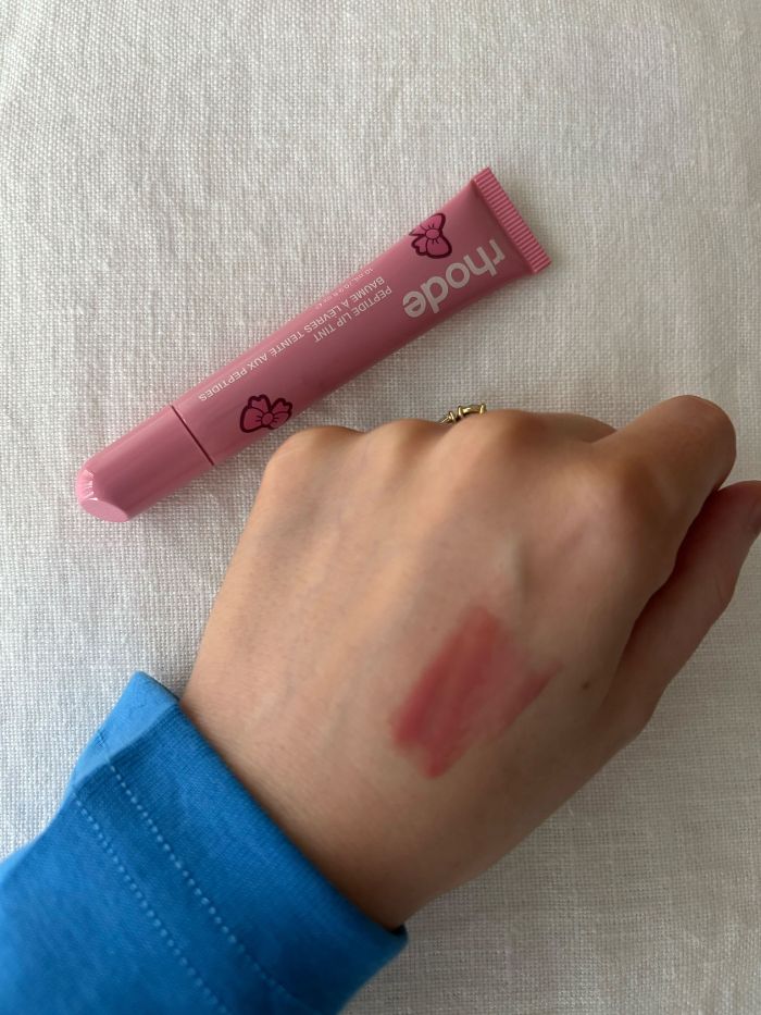 Deputy beauty editor Grace Lindsay swatching the Rhode Peptide Lip Tint