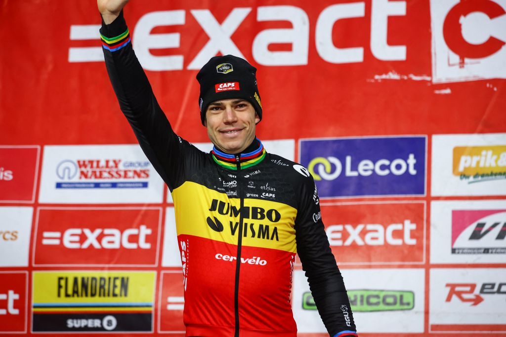 Belgian Wout Van Aert celebrates on the podium after winning the mens elite race of the cyclocross cycling event race 68 during the Exact Cross competition on December 30 2022 in Loenhout Belgium Belgium OUT Photo by DAVID PINTENS BELGA AFP Belgium OUT Photo by DAVID PINTENSBELGAAFP via Getty Images