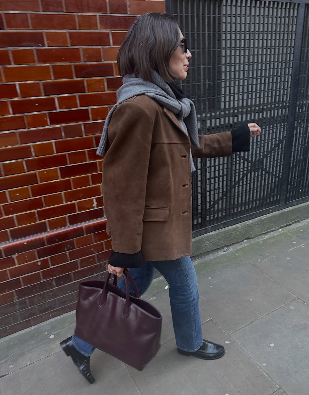 woman wearing suede button down jacket trend 2026