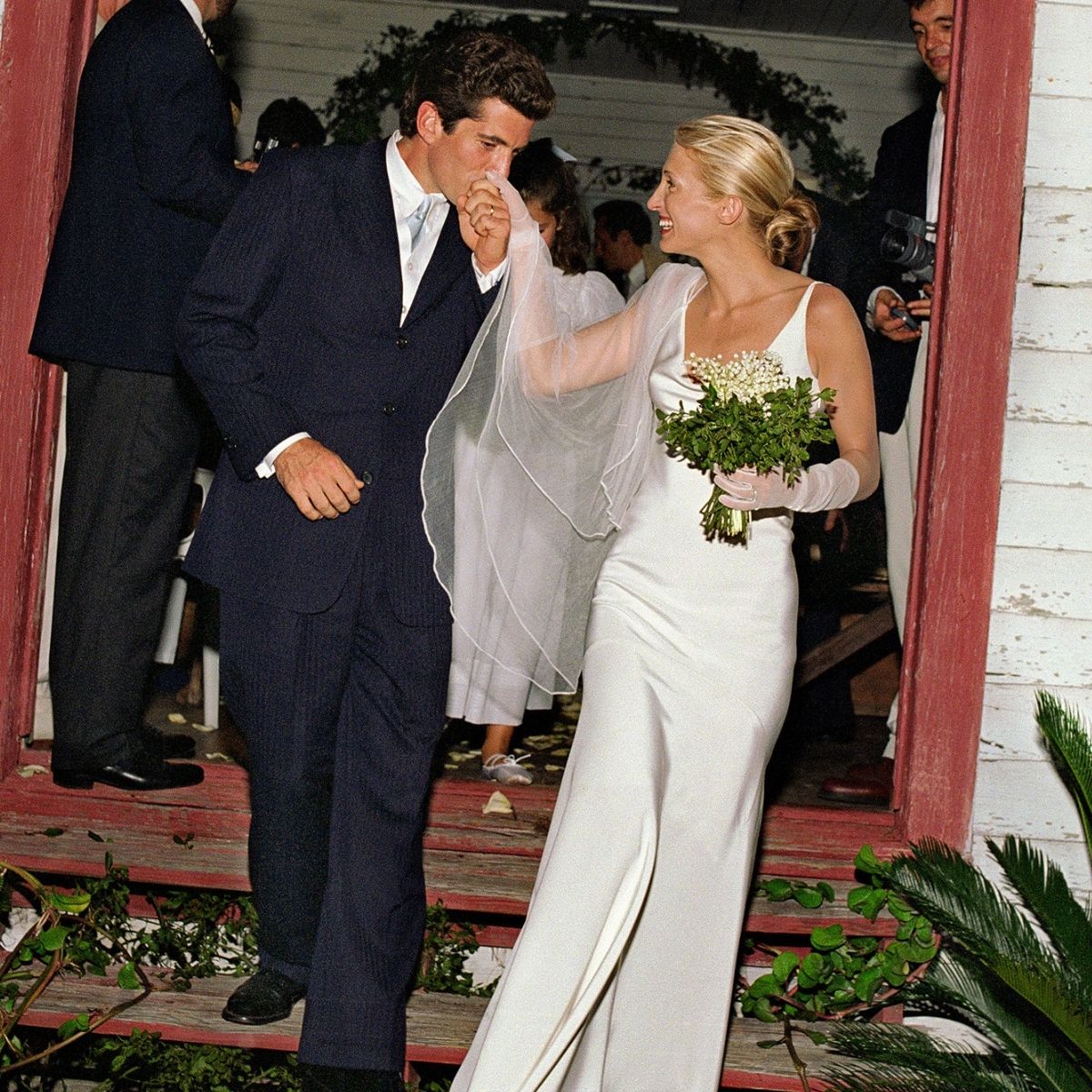 An image of Carolyn Bessette Kennedy in her Narciso Rodriguez wedding dress, which she wore to marry JFK Jr in 1996.