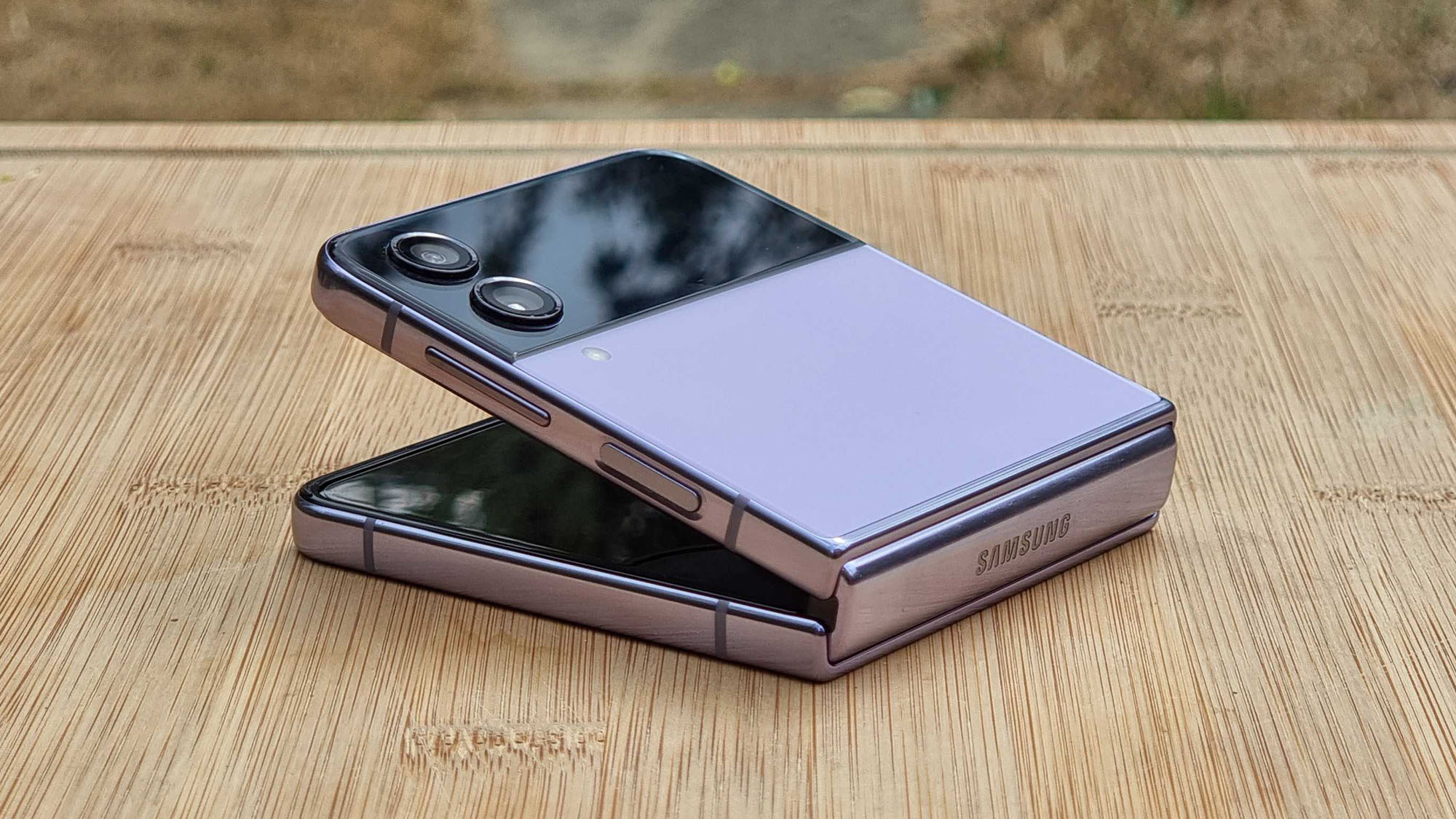 Samsung Galaxy Z Flip 4 Bora Purple review open at acute angle 16:9