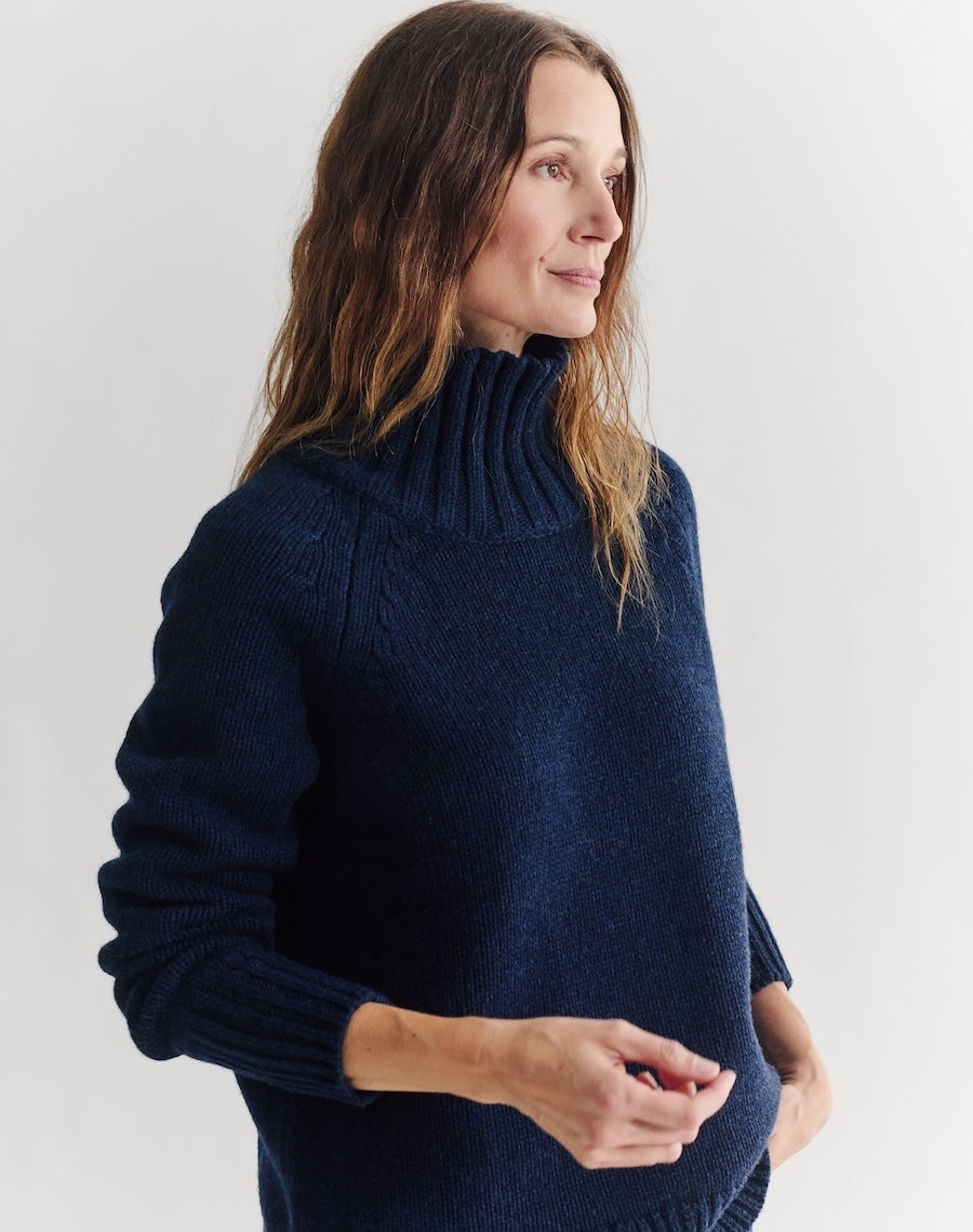 a model wearing a jumper from navygrey