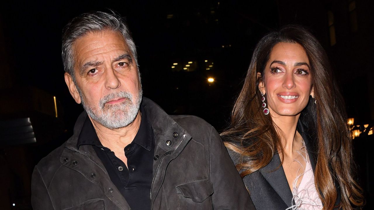 george and amal clooney walking together