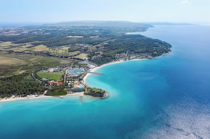An Aerial shot of the whole of Sani Resort, showing the 7km of coastline, 5 hotels, and the surrounding forest and wetlands 