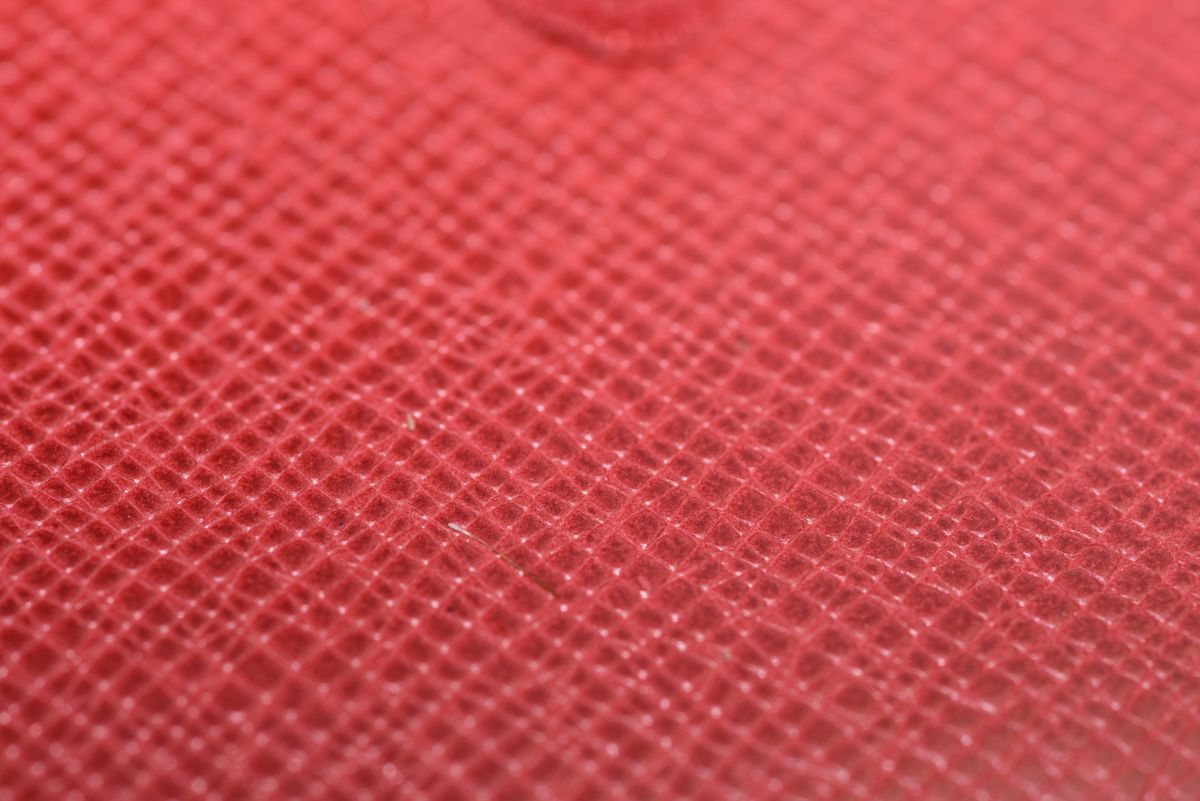 A macro photo taken with the Nikon D750 of a piece of red leather
