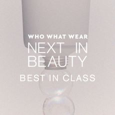 A bottle with bubbles coming out of it, overlayed with text that reads "Who What Wear Next in Beauty best in Class"